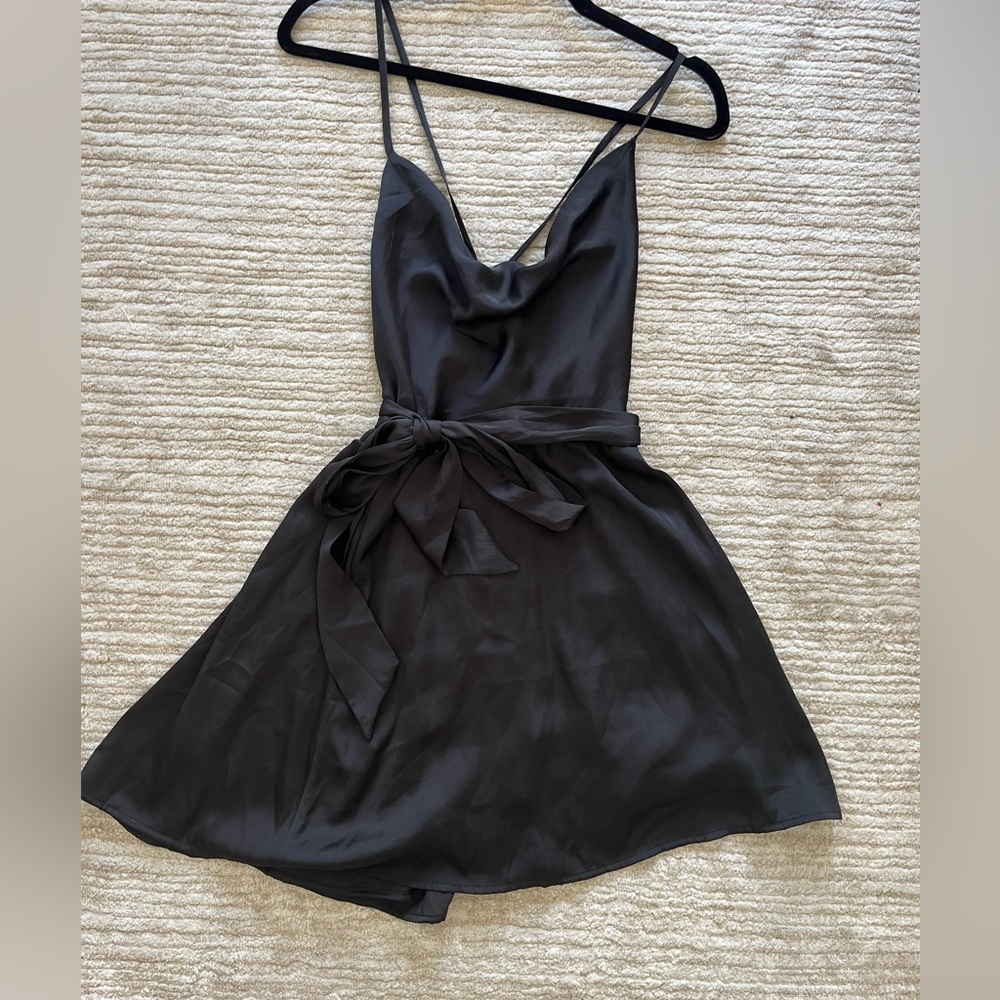 Gently worn- Free People little black silk dress. Tie detail.